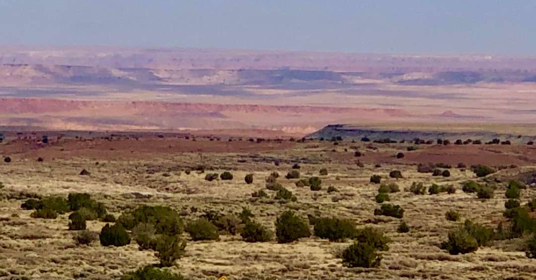Large plains with mountains in distance
